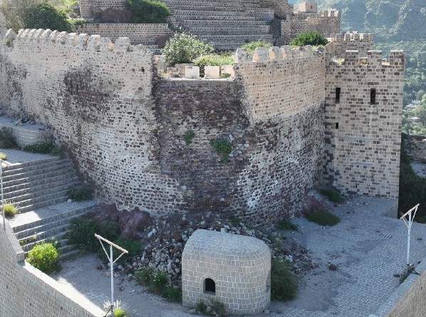 The partial collapse of the North Western retaining wall beside the pool.